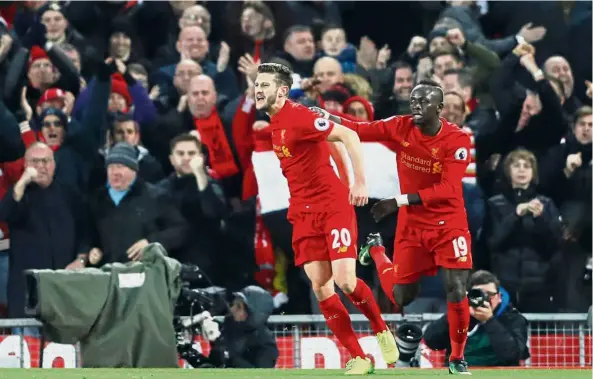  ?? — Reuters ?? Goal-getters: Liverpool’s Sadio Mane (right) with eight goals is the club’s top scorer followed by Adam Lallana who has netted seven.