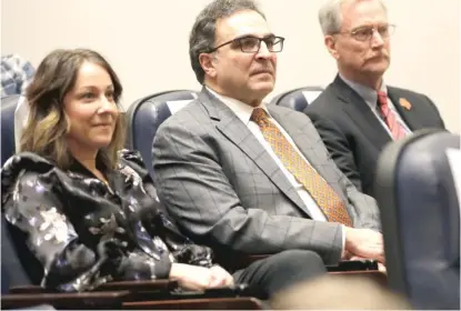  ?? CHARLES REX ARBOGAST/ AP PHOTOS ?? Nagy’s wife, Stacey, sits with Bears president Ted Phillips ( center) and chairman George McCaskey at Nagy’s introducto­ry news conference as the team’s coach Jan. 9 at Halas Hall.