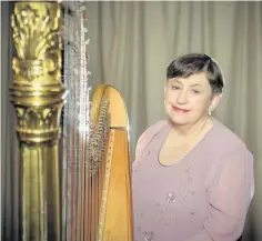  ??  ?? Harpist Sioned Williams premieres a new piece to remember the drowned village of Capel Celyn