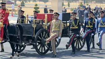  ??  ?? FINAL JOURNEY: Egyptian guards escort the coffin of former president Hosni Mubarak during his funeral ceremony at Cairo’s Mosheer Tantawy mosque on Wednesday. — AFP