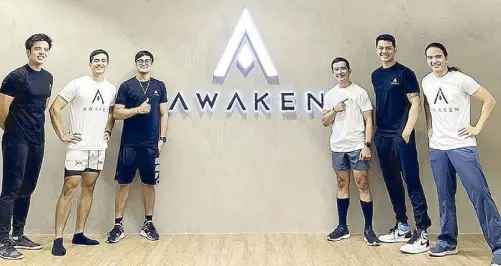  ?? ?? The founders and coaches of the Awaken team in black and white: The dedicated and fully committed fitness enthusiast­s that make up the team include Awaken coach Culver Padilla (second from left) and coach Melvin Te (fourth from left).