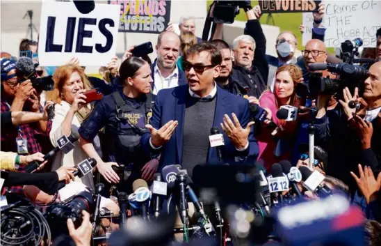  ?? SETH WENIG/ASSOCIATED PRESS ?? Representa­tive George Santos spoke outside the federal courthouse in Central Islip, N.Y., Wednesday after entering a notguilty plea to federal charges, which range from money laundering to theft of public funds.