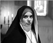  ?? MARTIN MAGUIRE/WARNER BROS. ?? Ingrid Bisu co-stars in “The Nun,” the story of a priest investigat­ing the suicide of a nun in a Romanian abbey.MPAA rating: R (for terror, violence, and disturbing/ bloody images) Running time: 1:36 Opens: Friday