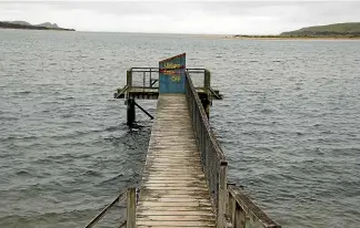  ?? MARY-JO TOHILL/STUFF ?? Damaged piles have closed the end of the Pounawea jetty until at least February until the Clutha District Council can carry out repairs.