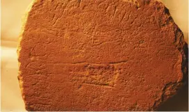  ?? (Courtesy Douglas Petrovich) ?? AN ANCIENT Egyptian stone slab – used by Prof. Douglas Petrovich in his research – is inscribed with the name Ahisamach, from Exodus 31:6.