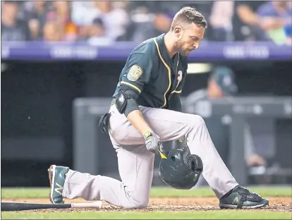  ?? DAVID ZALUBOWSKI — THE ASSOCIATED PRESS ?? Jed Lowrie and the rest of the A’s struggled for the second night in a row, scoring just one run again in their second straight loss.