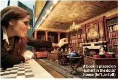  ??  ?? A book is placed on a shelf in the dolls’ house (left, in full)