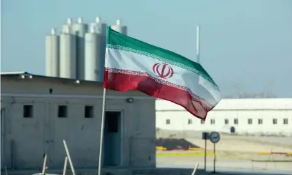  ?? Photograph: Atta Kenare/AFP via Getty Images ?? An Iranian flag at Bushehr, Iran’s only nuclear power station, during an official ceremony to kick-start works on a second reactor at the facility.