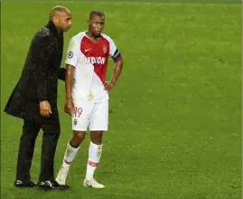  ?? (Photo AFP) ?? Thierry Henry et Djibril Sidibé, après la gifle de Bruges (-), mardi.