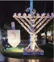  ?? Miami Herald file photo ?? The menorah and the dreidel on Lincoln Road in Miami Beach.