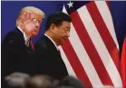  ?? Getty Images/tns ?? President Donald Trump and China’s President Xi Jinping meet business leaders at the Great Hall of the People on November 2017.