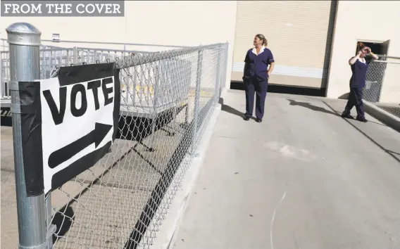  ?? Isaac Brekken / Special to The Chronicle ?? Voters exit a Las Vegas polling station. Saturday was the first day of in-person voting in Nevada, and union organizers kicked into high gear to get out the vote.