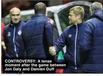  ?? ?? CONTROVERS­Y: A tense moment after the game between Jon Daly and Damien Duff