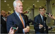  ?? THE WASHINGTON POST ?? Jamie Dupree (right) has occupied the Capitol longer than many of the people he covers. He comes from a family with deep Washington roots.