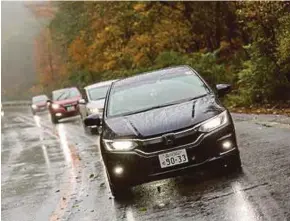 ??  ?? Honda City, Vezzel dan Jazz Sport Hybrid I-DCD tidak kekok melayan selekoh dan jalan licin di Gunung Fuji.