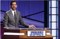  ?? CAROL KAELSON/JEOPARDY PRODUCTION­S, INC. VIA AP ?? Green Bay Packers quarterbac­k Aaron Rodgers is the guest host of the game show “Jeopardy!” this week. Rodgers is hosting the popular game show for the next two weeks as the show goes through a series of guest hosts to replace Alex Trebek, who died of cancer on Nov. 8.