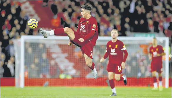  ?? REUTERS ?? Liverpool's Roberto Firmino in action during their Premier League match against Tottenham Hotspur at Anfield on Sunday night.