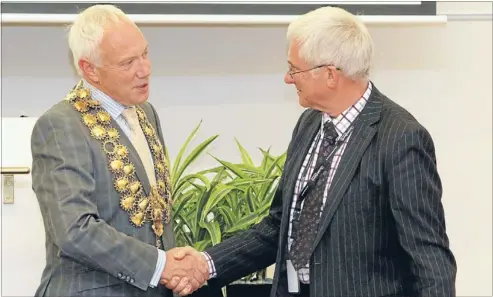  ?? Photo: KIRK HARGREAVES/FAIRFAX NZ ?? First day: Mayor Bob Parker welcomes former Christ Church Cathedral dean Peter Beck to his new role as city councillor.