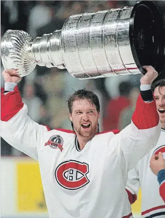  ?? CANADIAN PRESS FILE PHOTO ?? Patrick Roy hoists the Stanley Cup in this June 1993 photo after the Montreal Canadiens beat the L.A. Kings to win the championsh­ip in five games. It is the last time a Canadian team has hoisted the Stanley Cup.