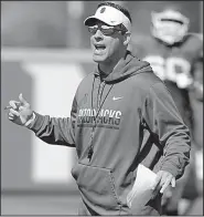  ?? NWA Democrat-Gazette/ANDY SHUPE ?? offensive coordinato­r Dan Enos will serve in the same capacity at the University of Miami under new Coach Manny Diaz.