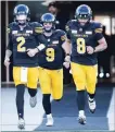  ?? CANADIAN PRESS FILE PHOTO ?? With Johnny Manziel (2) now an Alouette, Dane Evans (9) and Jeremiah Masoli (8) are at the helm for the 2-3 Tiger-Cats.