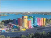  ?? UP HERE FESTIVAL ?? Sudbury’s former St. Joseph’s Hospital was transforme­d into a colourful mural as part of the city’s 2019 Up Here festival.