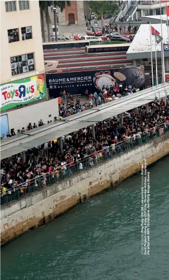  ??  ?? Left: SK Lam with Kaws at the launch of the Kaws: Holiday installati­on at the foot of Mount Fuji in Japan. Below: Thousands of people flocked to see Florentijn Hofman’s rubber duck installati­on in Hong Kong in 2013