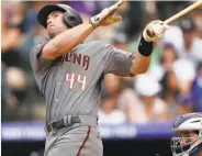  ?? David Zalubowski / Associated Press ?? Arizona’s Paul Goldschmid­t watches his three-run home run off Colorado’s Chad Bettis in the fourth.