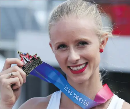  ?? FRED CHARTRAND/THE CANADIAN PRESS ?? Sage Watson has won 13 consecutiv­e gold medals in 400-metre hurdles, including this one at the Canadian Track and Field Championsh­ips. She says she wasn’t very good at the event until last year, after she transferre­d to the University of Arizona.