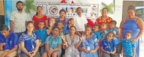  ?? Photo: Nicolette Cahmbers ?? The students of Lautoka School for Special Education, head teacher Kailash Pillay (back row, third from right), staff and parents at the school during the World Autism Awareness Day celebratio­n on April 1, 2021.