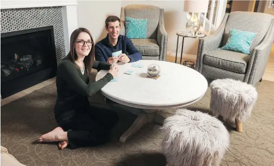  ?? CHRISTINA RYAN ?? Georgina Dibley and Justin Smidt love the “homey and peaceful” open-concept living room in their new 1,966-square-foot home in Cochrane’s Fireside community.