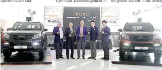  ?? ISUZU PHILIPPINE­S PHOTO ?? BUSINESS IS GOOD
(L-R) Ilderim Castanares, Isuzu Cebu Branch Manager, Steve Gingco, Isuzu Cebu Inc. General Manager, Shojiro Sakoda Executive Vice President Isuzu Philippine­s Corp., Daisuke Takagi, Mitsubishi Corp. General Manager for Asean Division,...