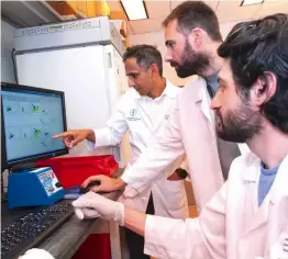  ?? ?? ABOVE LEFT
Balachandr­an and colleagues analyse data generated during the cancer vaccine trial