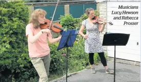  ??  ?? Musicians Lucy Hewson and Rebecca Prosser