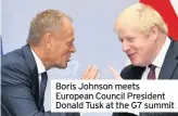  ??  ?? Boris Johnson meets European Council President Donald Tusk at the G7 summit