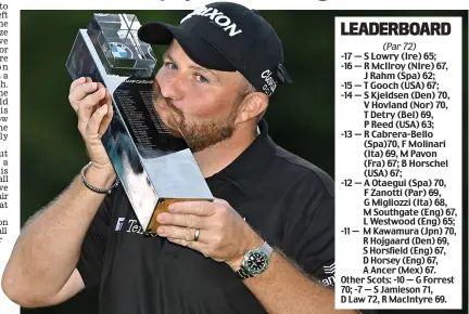  ?? ?? Sealed with a kiss: an elated Lowry with the BMW PGA Championsh­ip trophy at Wentworth