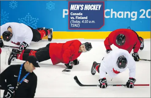  ?? LEAH HENNEL/POSTMEDIA NETWORK ?? The Canadian men put some work in ahead of their quarterfin­al matchup today against Finland.