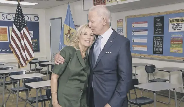  ??  ?? 0 Democratic presidenti­al candidate Joe Biden, with his wife Jill, after speaking during the second night of the Democratic National Convention