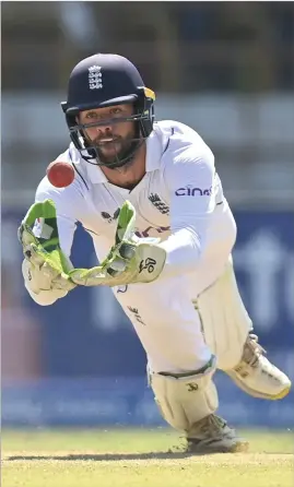  ?? ?? England wicketkeep­er Ben Foakes dives for a catch during the third Test in India