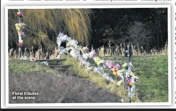  ??  ?? Floral tributes at the scene