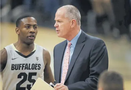 ??  ?? Colorado guard McKinley Wright, left, and coach Tad Boyle, right, had former Los Angeles Lakers star Kobe Bryant on their minds Monday. Wright said Bryant, who died Sunday, was “the reason I started playing.”