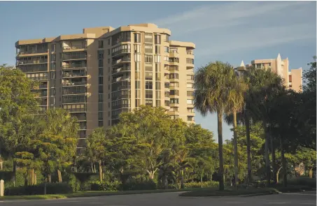  ?? Photos by Michael Adno / New York Times ?? Above: The Dorchester is a condominiu­m project at Pelican Bay, a 2,300-acre developmen­t along the Gulf Coast in Naples, Fla.