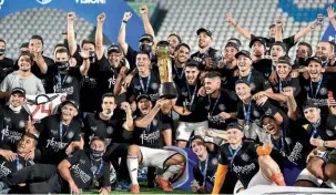  ??  ?? Champions…Olimpia lift the Clausura in Paraguay, the first South American nation to return to action