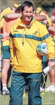  ?? Photo: FAIRFAX NZ ?? Uncomforta­ble fit: It’s always seemed odd seeing Robbie Deans in a Wallabies tracksuit.