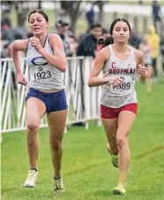  ?? Rodolfo Gonzalez/Contributo­r ?? Huffman Hargrave’s Jetzibe Trevino, right, reached the podium after her third-place showing at state.