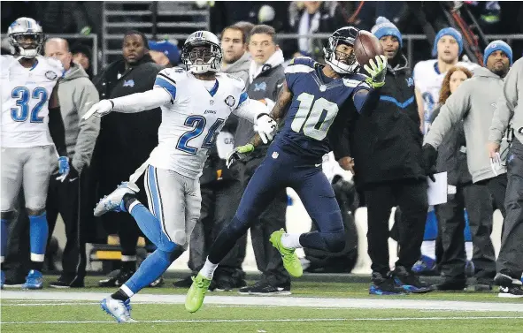  ?? — GETTY IMAGES FILES ?? Seattle Seahawks wide receiver Paul Richardson, right, likely introduced himself to a lot of football fans outside of Seattle when he scored an acrobatic touchdown and made a couple other highlight reel catches last weekend against the Detroit Lions.