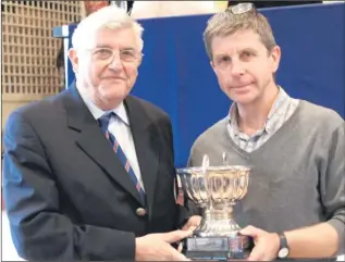  ??  ?? Terry Whyte (right), of Tankerton, receives the fair play award from John Weller, life vicepresid­ent of the league