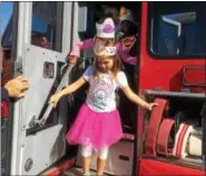  ?? EVAN BRANDT — DIGITAL FIRST MEDIA ?? Ringing Rocks Elementary School students got see, touch and sit in a Ringing Hill fire truck during a fire prevention program at the school Friday morning.