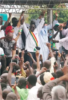  ??  ?? Cisse gestures during a protest against what he said is fraud in the second-round vote count in Bamako, Mali. — Reuters photo