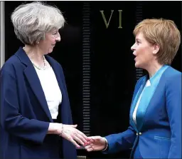  ??  ?? Rivals: Theresa May and Nicola Sturgeon meet at Bute House